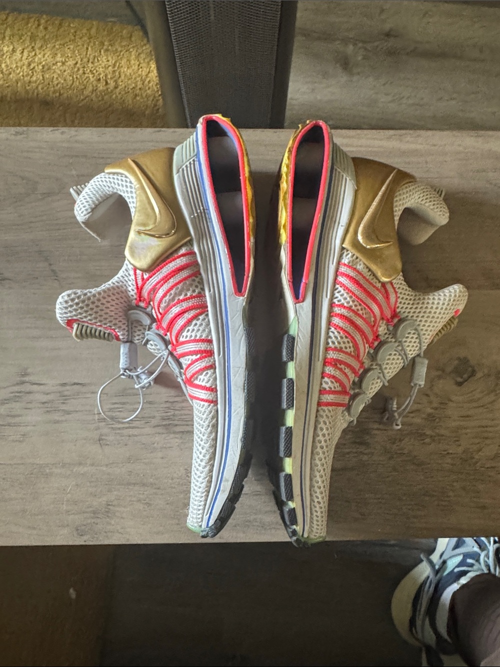 Nike Women's Running Shoes in White, Gold, and Pink